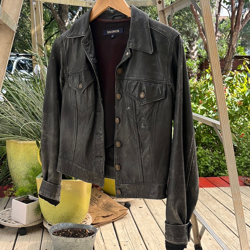 Distressed black leather jacket